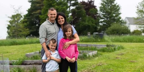 Patient and family outside in yard